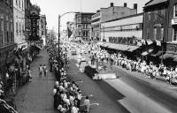 The former Woolworth site, seen here in a 1960s King Street parade. Photo courtesy of Doug Grant.